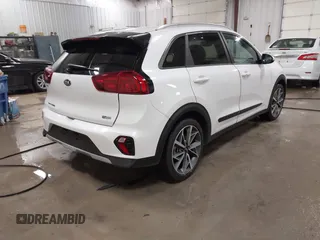 2021 Kia Niro Touring with VIN KNDCC3LC3M5463514, listed as a IAAI auction lot 41564596 with 29,063 mi miles. Bid and sale history available at carsss.com. Image 4.