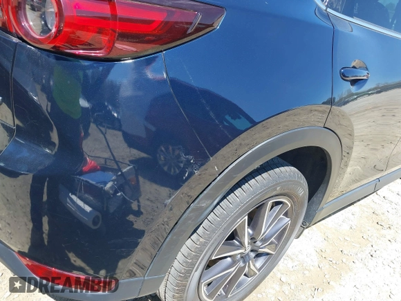 2018 Mazda CX-5 Grand Touring with VIN JM3KFADM1J0322049, listed as a IAAI auction lot 41891079 with 174,939 mi miles and . Bid and sale history available at DreamBid. Image 19.