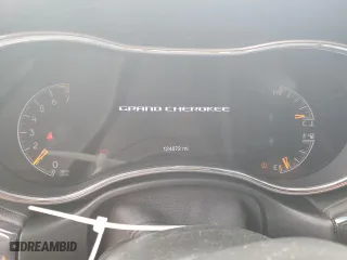 2019 Jeep Grand Cherokee Overland with VIN 1C4RJECG4KC833019, listed as a Copart auction lot 51277555 with 124,072 mi miles and Salvage Title. Bid and sale history available at carsss.com. Image 9.
