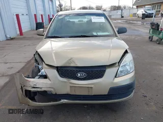 2009 Kia Rio SX with VIN KNADE223196512461, listed as a IAAI auction lot 41520063 with 132,558 mi miles. Bid and sale history available at carsss.com. Image 12.