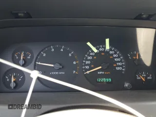 2004 Jeep Grand Cherokee Laredo with VIN 1J4GW48S54C430857, listed as a Copart auction lot 62744305 with 122,099 mi miles and Salvage title. Bid and sale history available at DreamBid. Image 9.