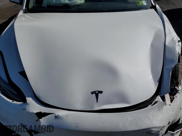 2023 Tesla Model 3 with VIN 5YJ3E1EA5PF567354, listed as a Copart auction lot 60964725 with 60,962 mi miles and Salvage title. Bid and sale history available at DreamBid. Image 11.