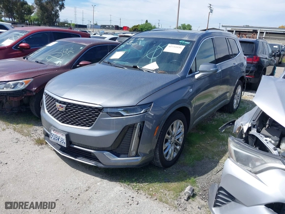 2020 Cadillac XT6 FWD Premium Luxury with VIN 1GYKPCRSXLZ105231, listed as a IAAI auction lot 41735556 with 70,319 mi miles. Bid and sale history available at carsss.com. Image 2.