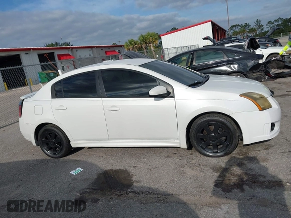 2012 Nissan Sentra 2.0 z VIN 3N1AB6AP0CL701340, wystawiony jako IAAI lot #42094800 z przebiegiem 189 128 mil mil oraz . Historia ofert i sprzedaży dostępna na DreamBid. Obrazek 13.