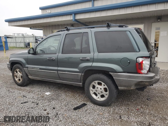 2002 Jeep Grand Cherokee z VIN 1J4GX38S72C152046, wystawiony jako Copart lot #57963095 z przebiegiem 204 576 mil mil oraz Szkoda całkowita • Salvage title. Historia ofert i sprzedaży dostępna na DreamBid. Obrazek 2.