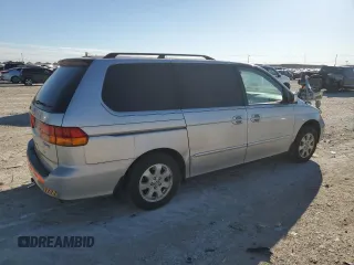 2003 Honda Odyssey EX-L with VIN 5FNRL18943B157513, listed as a Copart auction lot 47135305 with 199,079 mi miles and Salvage Title. Bid and sale history available at DreamBid. Image 3.