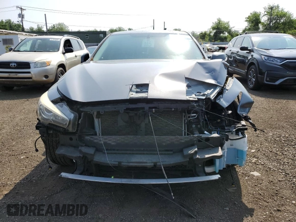 2015 Infiniti Q50 Premium with VIN JN1BV7AR9FM414737, listed as a Copart auction lot 62088065 with 118,668 mi miles and Salvage title. Bid and sale history available at DreamBid. Image 5.