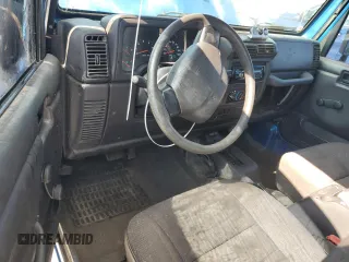 2002 Jeep Wrangler X with VIN 1J4FA39S92P776435, listed as a Copart auction lot 62792235 with 182,385 mi miles and Salvage title. Bid and sale history available at DreamBid. Image 8.