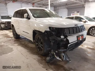 2021 Jeep Grand Cherokee Laredo X with VIN 1C4RJFAG6MC857933, listed as a IAAI auction lot 41358515 with 71,580 mi miles. Bid and sale history available at carsss.com. Image 1.