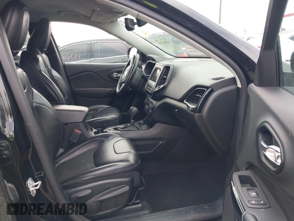 2020 Jeep Cherokee Altitude with VIN 1C4PJMLX9LD634920, listed as a IAAI auction lot 41892720 with 75,388 mi miles and . Bid and sale history available at DreamBid. Image 5.
