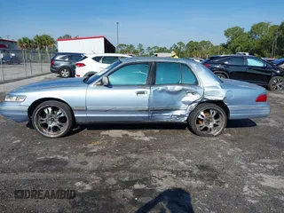 1997 Mercury Grand Marquis LS with VIN 2MELM75W7VX708034, listed as a IAAI auction lot 41878938 with 197,818 mi miles and . Bid and sale history available at DreamBid. Image 6.