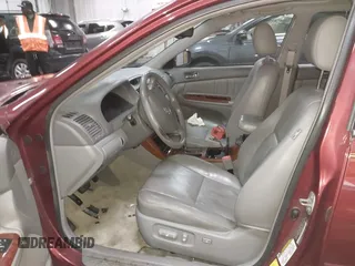 2005 Toyota Camry LE with VIN 4T1BF30KX5U099450, listed as a IAAI auction lot 41670099 with Not Provided miles and . Bid and sale history available at DreamBid. Image 5.