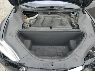 2019 Tesla Model S 75D with VIN 5YJSA1E25KF299740, listed as a Copart auction lot 55821595 with 140,385 mi miles and Salvage title. Bid and sale history available at DreamBid. Image 11.
