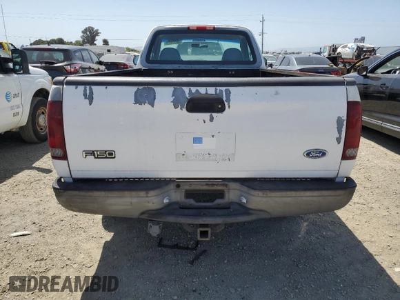 1997 Ford F-150 z VIN 1FTDF1722VKA23000, wystawiony jako Copart lot #59221975 z przebiegiem 182 352 mil mil oraz Czysty tytuł • Clean title. Historia ofert i sprzedaży dostępna na DreamBid. Obrazek 6.