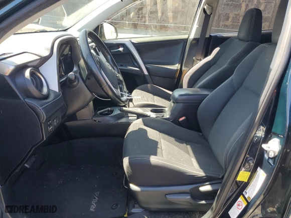 2018 Toyota RAV4 XLE with VIN JTMWFREV9JJ745584, listed as a Copart auction lot 51451885 with 114,985 mi miles and Salvage Title. Bid and sale history available at carsss.com. Image 7.