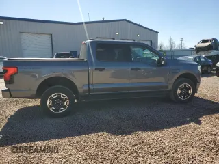 2023 Ford F-150 Lightning Pro with VIN 1FTVW1EL8PWG10894, listed as a Copart auction lot 50988655 with 34,020 mi miles and Salvage Title. Bid and sale history available at DreamBid. Image 12.