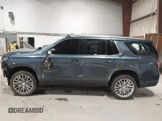 2021 Chevrolet Tahoe LT z VIN 1GNSKNKD5MR354265, wystawiony jako IAAI lot #42331890 z przebiegiem 106 250 mil mil oraz . Historia ofert i sprzedaży dostępna na DreamBid. Obrazek 15.