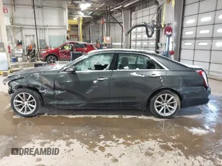 2017 Cadillac CTS Luxury AWD with VIN 1G6AX5SS5H0175404, listed as a IAAI auction lot 41584754 with 231,354 mi miles and . Bid and sale history available at DreamBid. Image 14.
