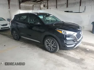 2020 Hyundai Tucson SEL with VIN KM8J3CAL9LU106977, listed as a Copart auction lot 61456665 with 73,674 mi miles and Salvage title. Bid and sale history available at DreamBid. Image 4.