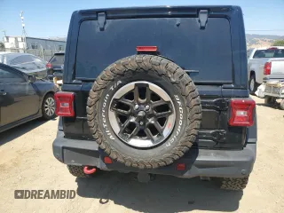 2020 Jeep Wrangler Unlimited Rubicon с VIN 1C4HJXFN3LW350249, выставлен на аукционе Copart как лот 60696895 с пробегом 56 577 миль миль и Списание • Salvage title. История ставок и продаж доступна на DreamBid. Изображение 6.