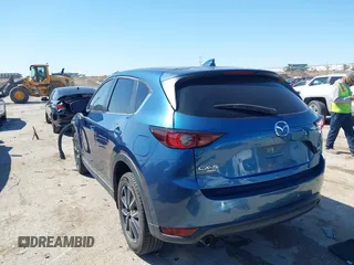 2018 Mazda CX-5 Touring with VIN JM3KFBCM0J0302916, listed as a IAAI auction lot 41837733 with 100,765 mi miles. Bid and sale history available at carsss.com. Image 3.