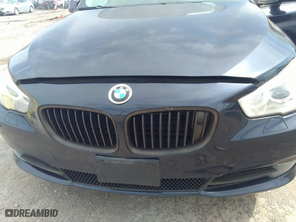 2012 BMW 5 Series Gran Turismo 550i xDrive with VIN WBASP4C53CC341928, listed as a IAAI auction lot 36580839 with 93,808 mi miles. Bid and sale history available at carsss.com. Image 6.