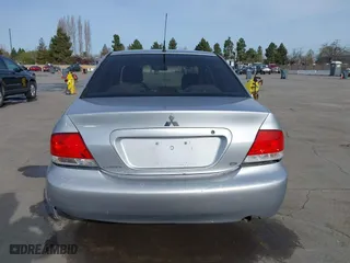 2004 Mitsubishi Lancer ES with VIN JA3AJ26E54U052124, listed as a IAAI auction lot 41804473 with 165,786 mi miles. Bid and sale history available at carsss.com. Image 17.