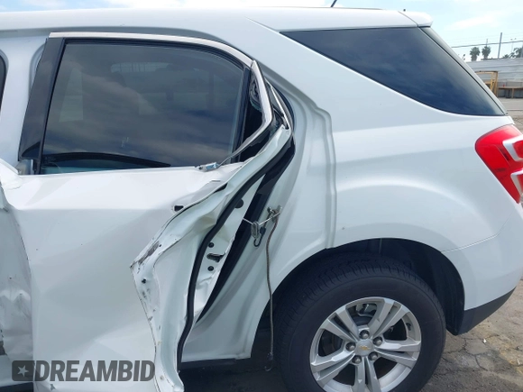 2017 Chevrolet Equinox LS z VIN 2GNALBEK3H1527409, wystawiony jako IAAI lot #41889347 z przebiegiem 114 037 mil mil oraz . Historia ofert i sprzedaży dostępna na DreamBid. Obrazek 6.