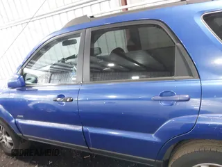 2005 Kia Sportage LX with VIN KNDJE723757109849, listed as a IAAI auction lot 41505516 with 243,556 mi miles and . Bid and sale history available at carsss.com. Image 13.