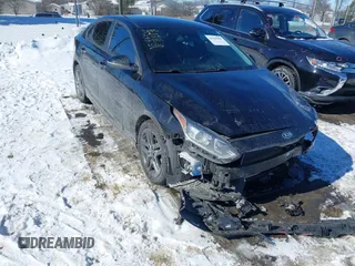 2021 Kia Forte GT-Line z VIN 3KPF34AD4ME293103, wystawiony jako IAAI lot #41643909 z przebiegiem 58 807 mil mil oraz . Historia ofert i sprzedaży dostępna na DreamBid. Obrazek 1.
