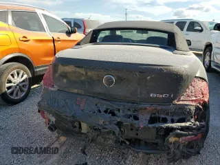 2007 BMW 6 Series 650i with VIN WBAEK135X7CN81963, listed as a Copart auction lot 73875324 with 0 mi miles and Salvage Title. Bid and sale history available at carsss.com. Image 6.