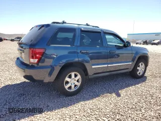 2010 Jeep Grand Cherokee Laredo with VIN 1J4PR4GK9AC104970, listed as a Copart auction lot 72173034 with 120,354 mi miles and Salvage Title. Bid and sale history available at carsss.com. Image 3.