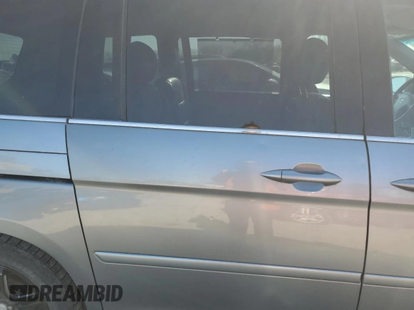 2007 Honda Odyssey Touring z VIN 5FNRL38887B062123, wystawiony jako Copart lot #52140755 z przebiegiem 240 710 mil mil oraz Szkoda całkowita • Salvage title. Historia ofert i sprzedaży dostępna na DreamBid. Obrazek 11.