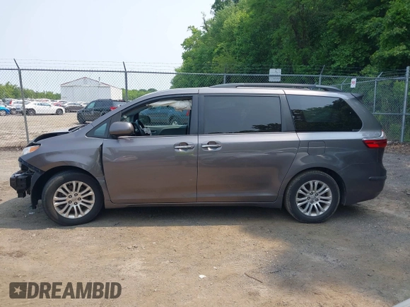 2015 Toyota Sienna XLE with VIN 5TDYK3DC6FS553695, listed as a IAAI auction lot 42418507 with 137,677 mi miles and . Bid and sale history available at DreamBid. Image 14.
