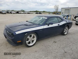 2013 Dodge Challenger R/T z VIN 2C3CDYBT9DH585965, wystawiony jako Copart lot #52995875 z przebiegiem 131 456 mil mil oraz Szkoda całkowita • Salvage title. Historia ofert i sprzedaży dostępna na DreamBid. Obrazek 1.