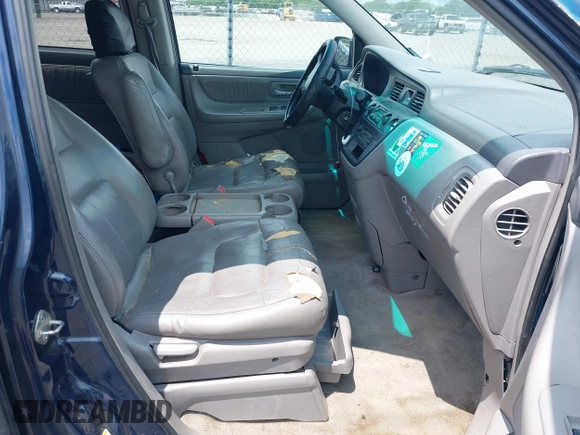 2003 Honda Odyssey EX-L z VIN 5FNRL18923B101344, wystawiony jako IAAI lot #42379995 z przebiegiem 222 877 mil mil oraz . Historia ofert i sprzedaży dostępna na DreamBid. Obrazek 5.