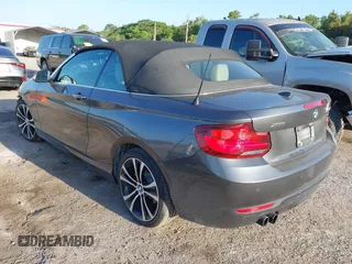 2020 BMW 2 Series 230i xDrive with VIN WBA2K1C08L7G28887, listed as a IAAI auction lot 42122785 with 30,599 mi miles and . Bid and sale history available at carsss.com. Image 3.