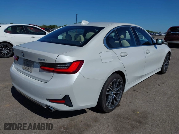 2021 BMW 3 Series 330i xDrive with VIN WBA5R7C0XMFK54525, listed as a IAAI auction lot 42320181 with 54,576 mi miles and . Bid and sale history available at DreamBid. Image 4.