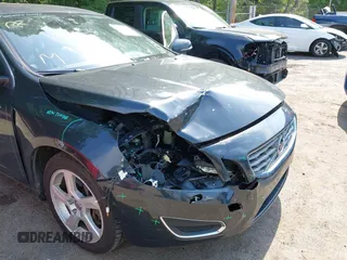 2013 Volvo S60 T5 Premier z VIN YV1612FS8D2209602, wystawiony jako IAAI lot #42226472 z przebiegiem 161 889 mil mil oraz . Historia ofert i sprzedaży dostępna na DreamBid. Obrazek 6.