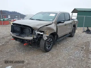 2024 Nissan Titan Pro-4X z VIN 1N6AA1ED0RN114614, wystawiony jako IAAI lot #41548196 z przebiegiem 3 405 mil mil oraz . Historia ofert i sprzedaży dostępna na DreamBid. Obrazek 2.