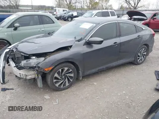 2018 Honda Civic EX with VIN 2HGFC2F79JH570403, listed as a IAAI auction lot 42018123 with 165,821 mi miles and . Bid and sale history available at DreamBid. Image 2.