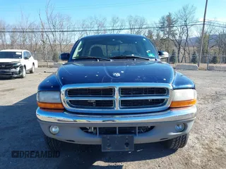 2004 Dodge Dakota SLT with VIN 1D7HG42N64S591353, listed as a IAAI auction lot 41714631 with 186,520 mi miles. Bid and sale history available at carsss.com. Image 6.
