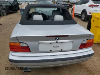 1998 BMW 3 Series 323i with VIN WBABJ8332WEM22760, listed as a Copart auction lot 59631805 with 77,300 mi miles and Salvage title. Bid and sale history available at DreamBid. Image 6.