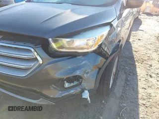 2018 Ford Escape SE with VIN 1FMCU0GD0JUA87303, listed as a IAAI auction lot 41612502 with 70,233 mi miles. Bid and sale history available at carsss.com. Image 6.