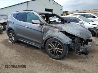 2017 Hyundai Santa Fe 2.0T z VIN 5XYZUDLA6HG406037, wystawiony jako Copart lot #61124765 z przebiegiem Nie podano mil oraz Nie do naprawy • Non repairable. Historia ofert i sprzedaży dostępna na DreamBid. Obrazek 4.