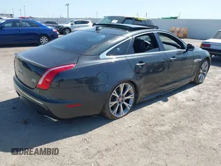 2015 Jaguar XJ R-Sport with VIN SAJWJ1CD6F8V83990, listed as a IAAI auction lot 41936162 with Not Provided miles and . Bid and sale history available at DreamBid. Image 4.