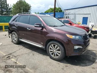 2013 Kia Sorento SX with VIN 5XYKWDA2XDG363999, listed as a Copart auction lot 58200985 with 69,056 mi miles and Salvage title. Bid and sale history available at DreamBid. Image 4.