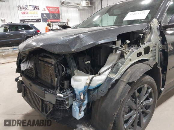 2022 Chevrolet Equinox RS with VIN 3GNAXWEV0NS173242, listed as a IAAI auction lot 42483371 with 28,159 mi miles and . Bid and sale history available at DreamBid. Image 6.