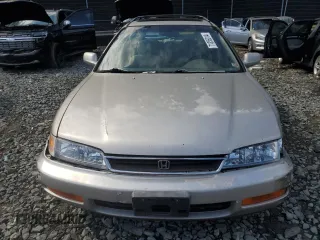1997 Honda Accord EX with VIN 1HGCE189XVA001554, listed as a Copart auction lot 71355014 with 217,696 mi miles and Salvage Title. Bid and sale history available at carsss.com. Image 5.