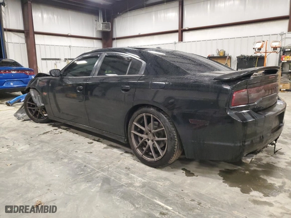 2013 Dodge Charger RT Plus with VIN 2C3CDXCT0DH729539, listed as a Copart auction lot 42966575 with 162,453 mi miles and Salvage Title. Bid and sale history available at carsss.com. Image 2.